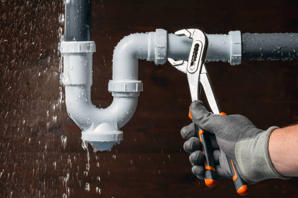 Professional Emergency Plumber technician working in Riegelsville, PA